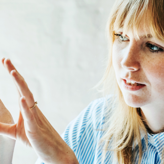 Female read person in a conversation